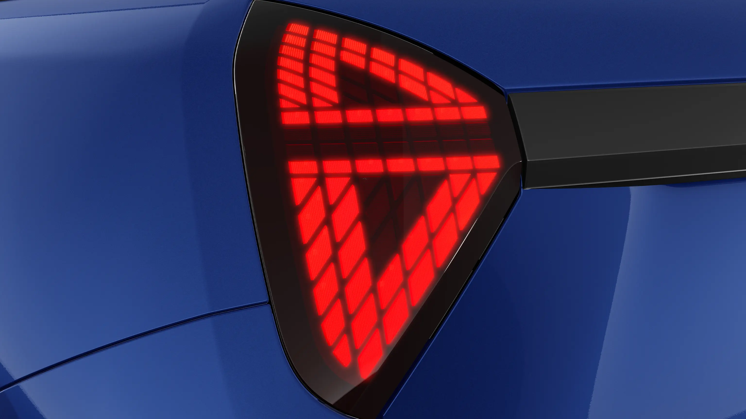 Detail view of the all-electric MINI Cooper rear light with red lights on