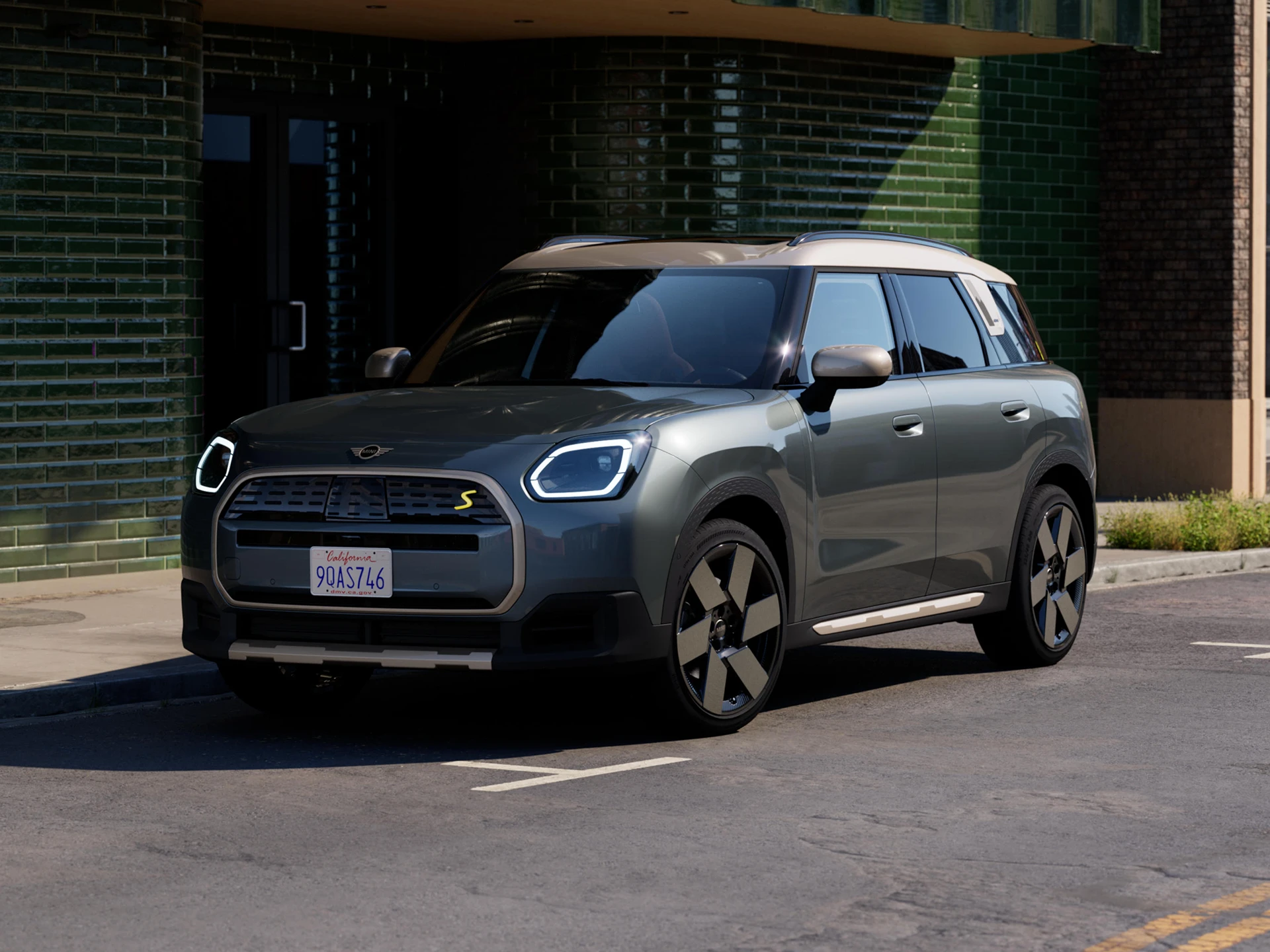 Video showcasing the interior and exterior of an all-electric MINI Countryman in detail. The camera pans across the dashboard, highlighting design elements.