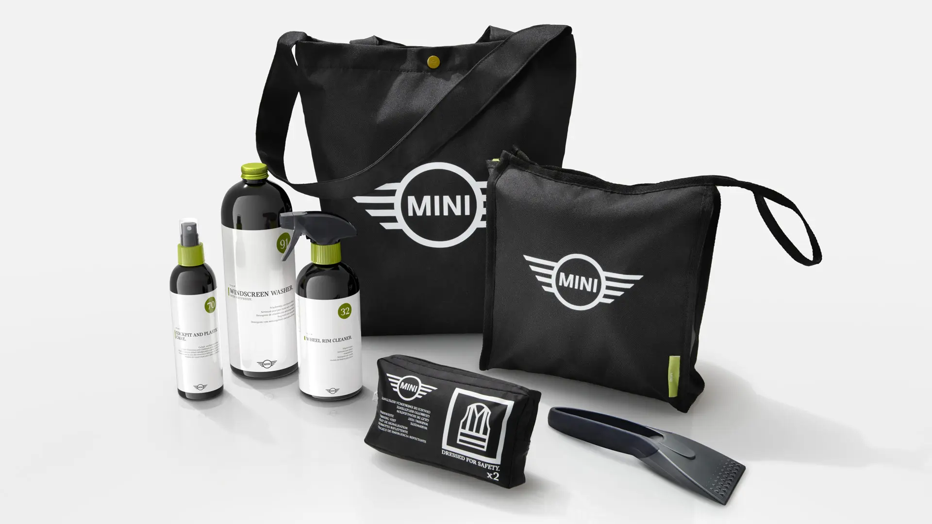 A selection of MINI Car Care Set cleaning products in black MINI branded bags.
