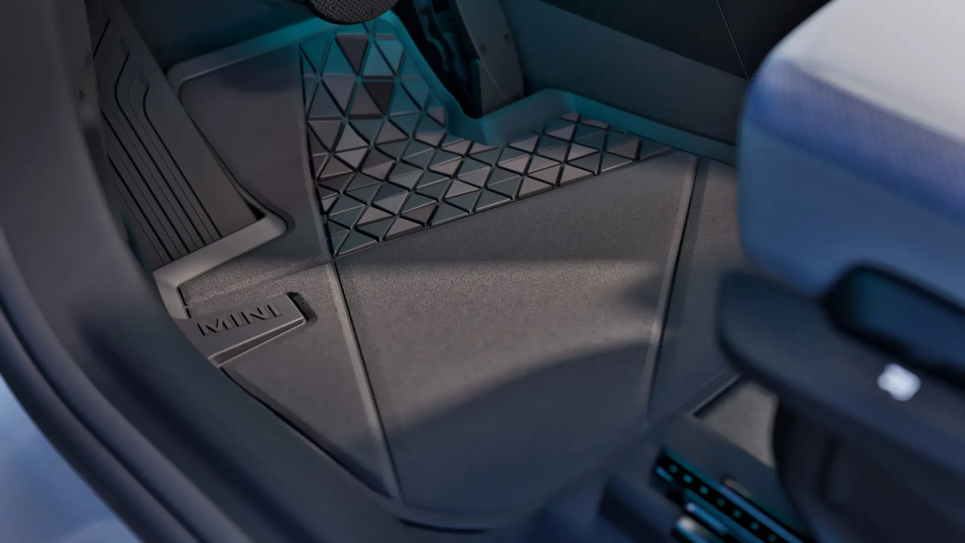 Custom-fit, durable black MINI all-weather floor mat featuring MINI logo.