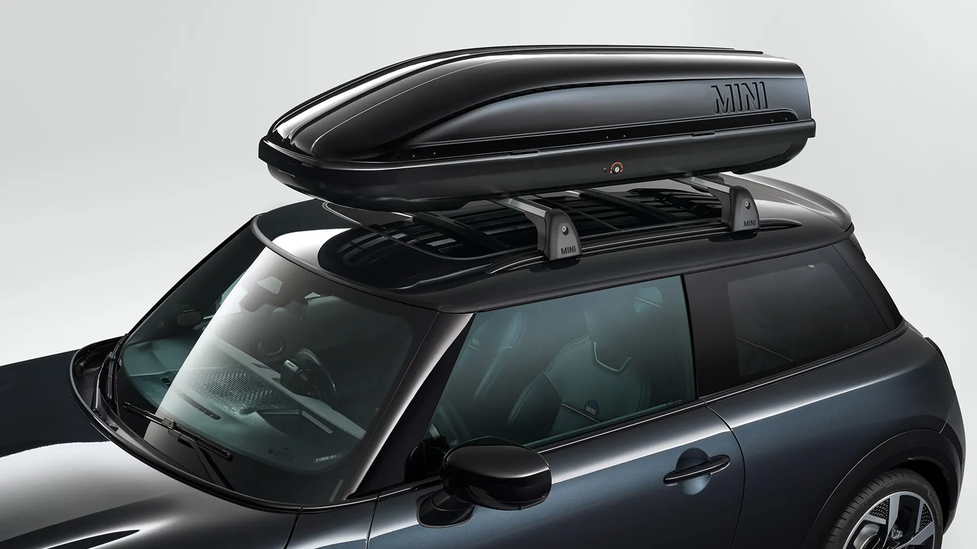 MINI Cooper 3-door in black with black MINI roof box 320.