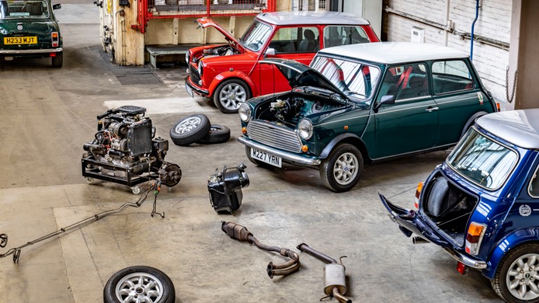 MINI Recharged mechanic working on the engine
